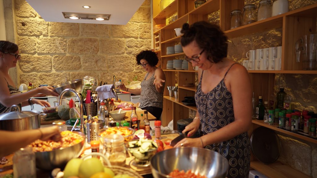 cooking together at sun and co. coliving